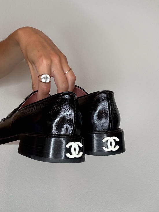 CHANEL Shoes - CHANEL Black Patent Leather Loafers with White CC Heel Accents